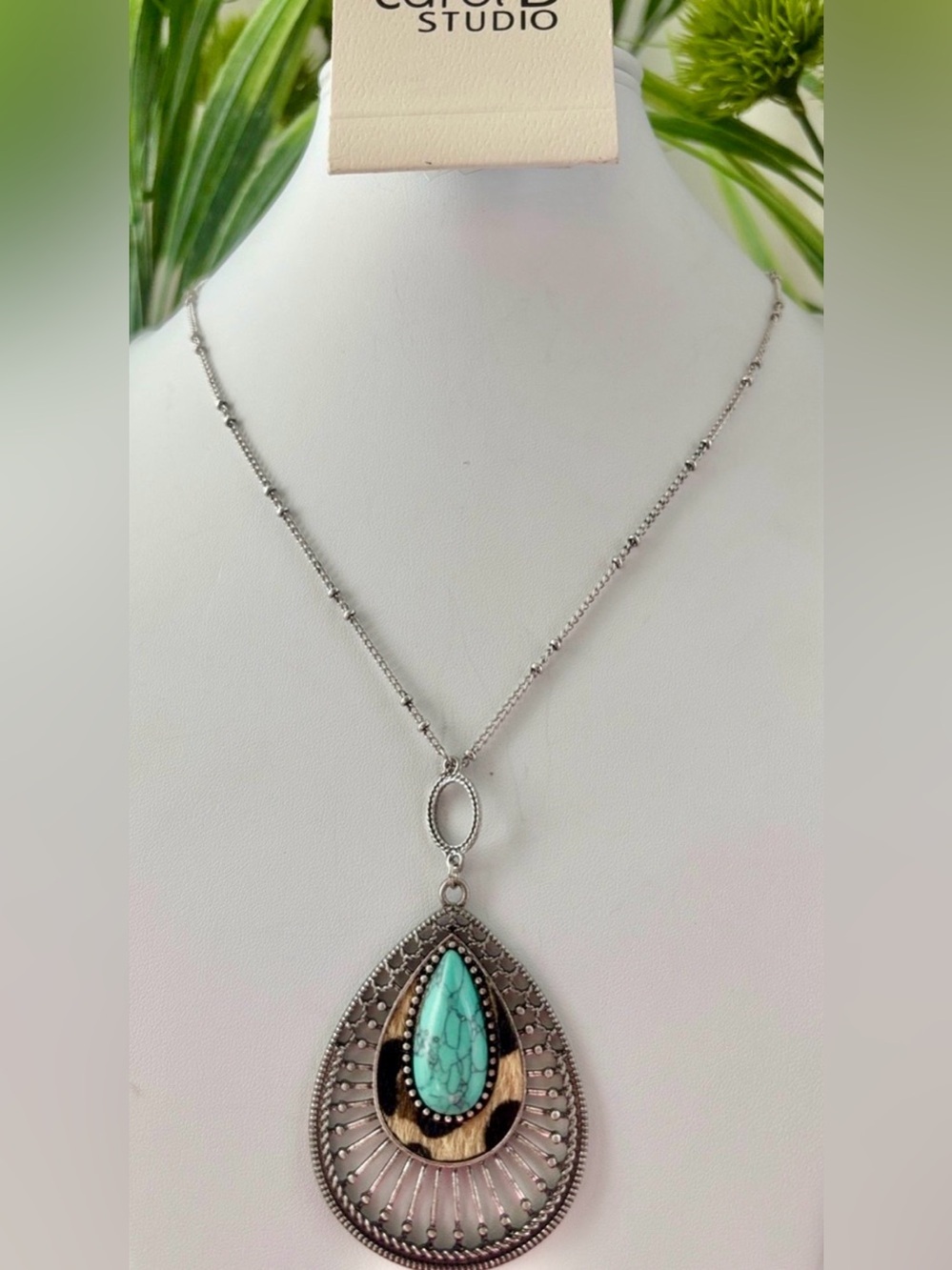 Carol D Calf Hair leopard print teardrop intricate frame,turquoise stone,pendant